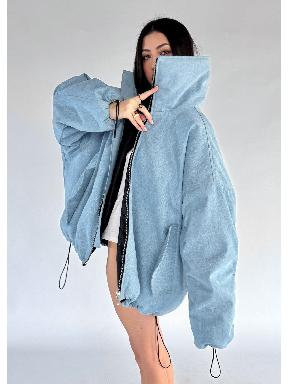 Light blue oversized denim bomber jacket