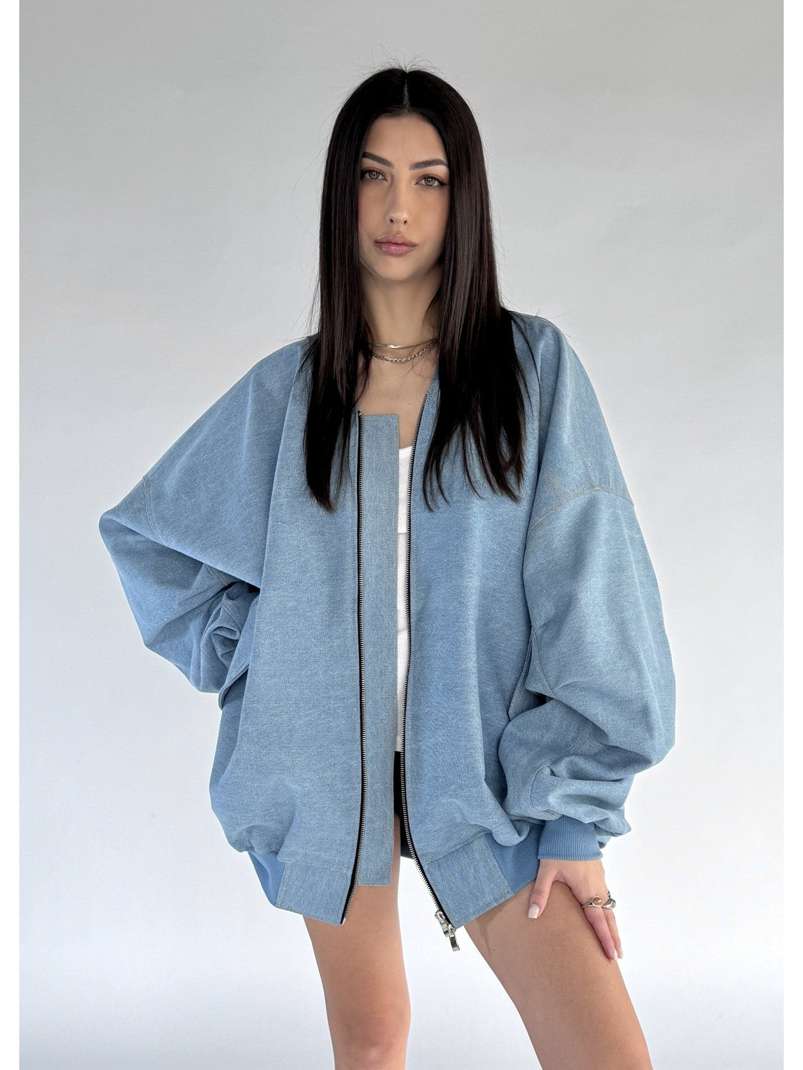 Light blue oversized denim bomber jacket
