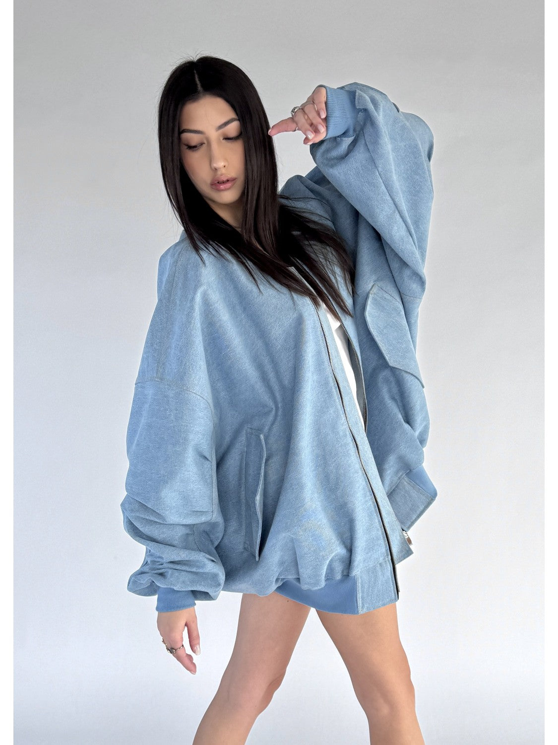 Light blue oversized denim bomber jacket